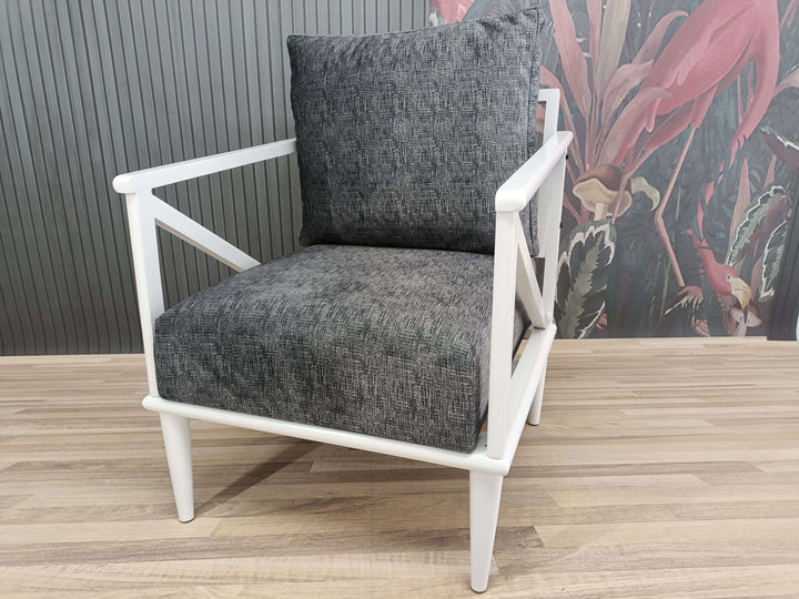 White Upholstered Armchair with Classic Legs, Detailed View of Upholstered Armchair Cushion, Comfortable Home Library Armchair